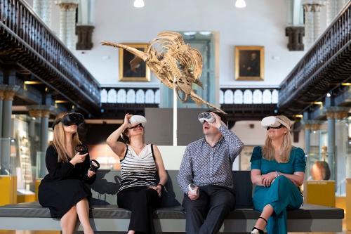 Four researchers wear VR headsets in the Hunterian museum